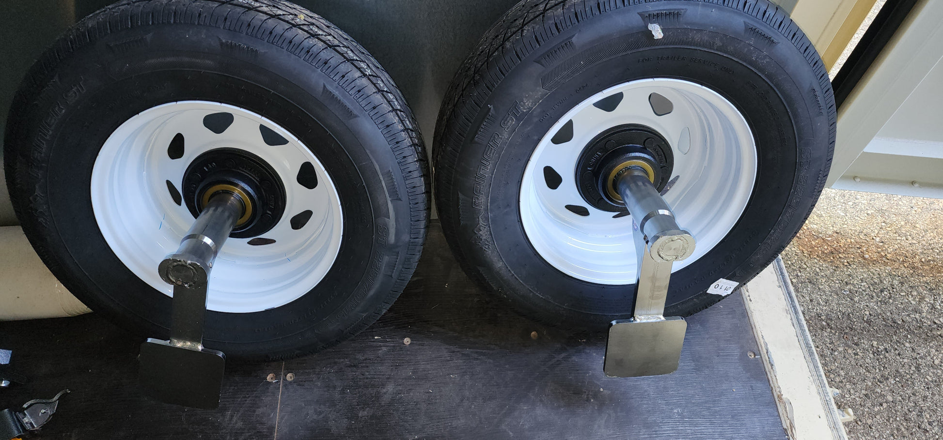 Wheels & Tires 1 Pair - These are set onto one end of the container to facilitate moving the container around your property.